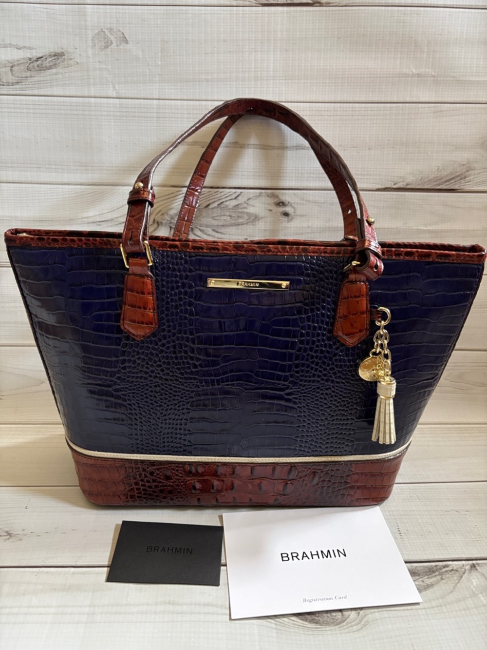 BRAHMIN Croc-Embossed Navy and Brown Tote Bag with Tassel Charm